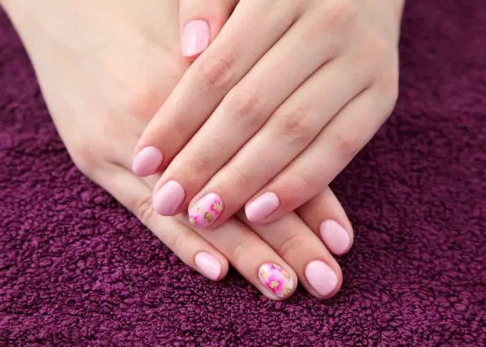 pink acrylic overlay on natural nails